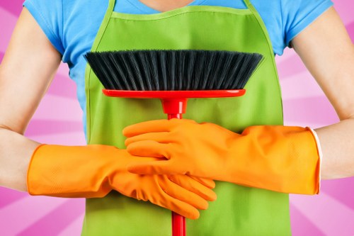 Professional using extraction equipment with safety precautions