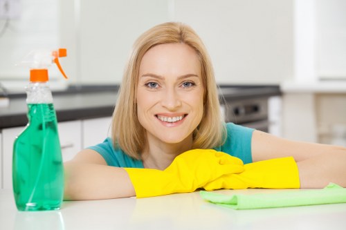 Trained carpet cleaner using protective equipment during a job